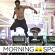 A very fit, shirtless zombie leaps over a row of casino slot machines in a scene from Zack Snyder's Army of the Dead.